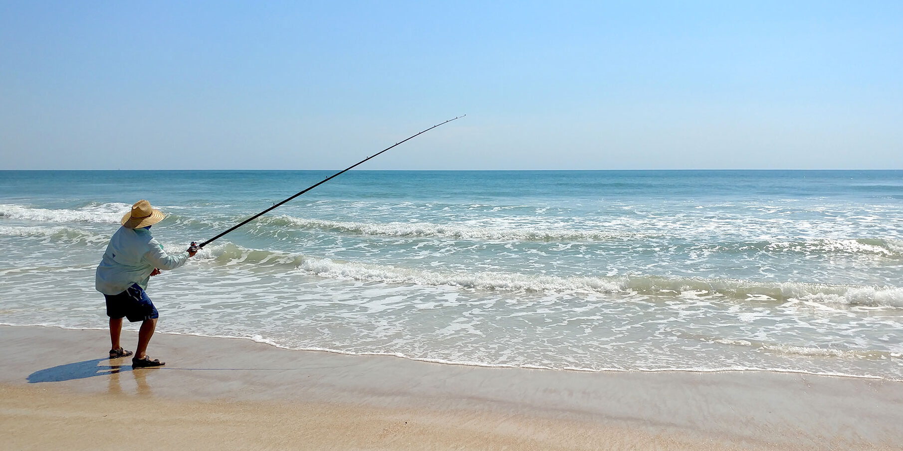 Fisherman-at-Guana-River-State-Park-Beach-S.-Marty-use-attribution