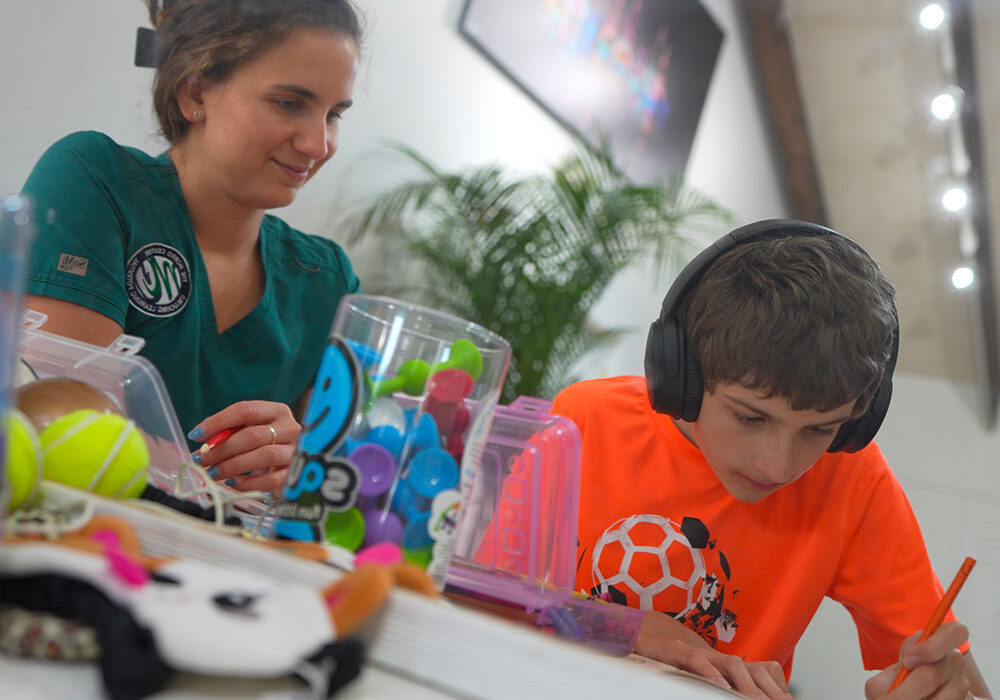 Innovations-Autism-Dr-Verzwyvelt-with-student