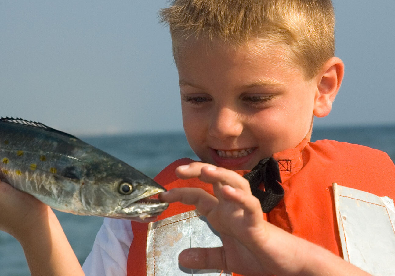 boy-holding-fish